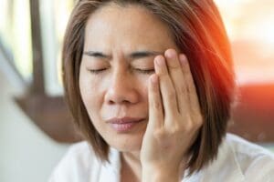 Problems in the mouth, jaw, and surrounding structures can often be the root cause, or at least a contributing factor, of chronic headaches.